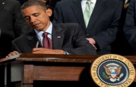Obama signs financial regulation reform bill