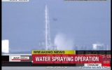 Helicopters dump water to cool down Japan's overheating reactors