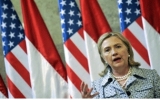 Clinton to briefly visit China