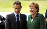 Sarkozy and Merkel push euro integration, no joint bonds