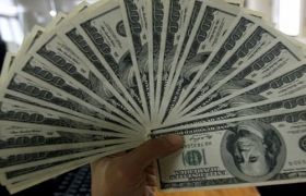 Không được trả lương bằng USD?