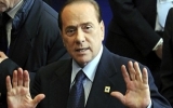 Italy crisis: PM Silvio Berlusconi resigns