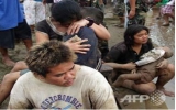 Philippine flood toll surges by more than 200