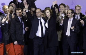 Hollande vows to serve France well, facing challenges