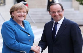 Hollande, Merkel meet to solve eurozone crisis ahead of crucial EU summit