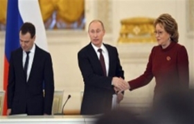 Putin signs ban on U.S. adoptions of Russian children