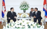 PM meets Cambodian, French leaders