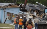 Florida home where sinkhole swallowed man is partially razed