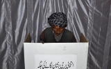 Pakistan votes in landmark polls as bomb kills 11