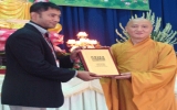 Binh Duong Buddhist Sangha receives record certificate of “Asian longest Buddha statue entering Nirvana on temple roof”