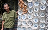 The bizarre house covered by 8,000 ancient dishes