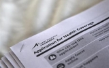 Nearly half million apply for U.S. health insurance despite flaws