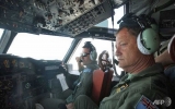 Australia widens MH370 search area as hunt ramps up