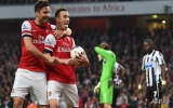 Football: Arsenal eye Champions League after Newcastle stroll