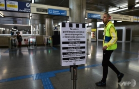Subway staff stick with strike snarling World Cup city