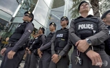 EU raps Thailand on coup, cuts official contacts