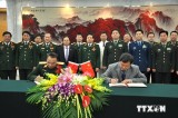 Quân đội Việt-Trung ký ghi nhớ kỹ thuật lập đường dây liên lạc