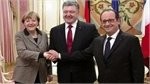 Ukraine crisis: Hollande and Merkel in key truce talks in Moscow