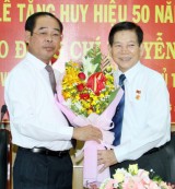 Local party committee grants 50-year Party insignia to former State President Nguyen Minh Triet