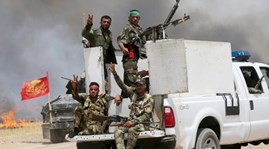 Iraq Shi'ite militia take lead in campaign to reverse Islamic State gains