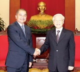 Tổng Bí thư Nguyễn Phú Trọng tiếp Đoàn đại biểu Đảng NDCM Lào