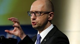 Ukraine, rebels urged to sign deal extending arms withdrawal