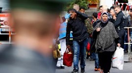 Hit by new wave of refugees, Germany warns EU partners
