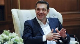 Triumphant Tsipras returns to fight for Greek economy, debt relief