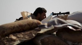 Syrian army and Russian jets target rebel towns north of Homs
