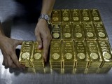 Giá vàng giảm xuống sát mức thấp nhất trong gần 6 năm qua