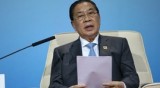 Laos issues new Constitution