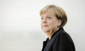 Germany's Merkel says she has not changed course on migrant policy