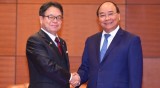 越南政府总理阮春福会见日本经济贸易和工业大臣