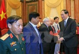 President meets former volunteer soldiers in Cambodia