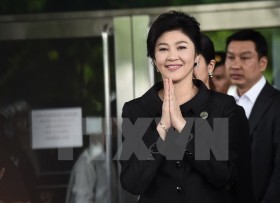 Thailand considers revoking former PM Yingluck’s passports