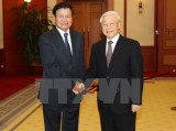 越南党、国家、国会领导人分别会见老挝政府总理通伦•西苏里