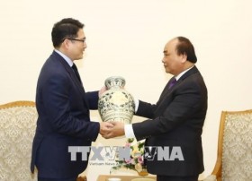 PM promises optimal conditions for Korean investors
