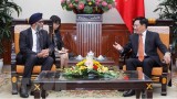 越南政府副总理兼外交部长范平明会见加拿大国防部长哈吉特•萨吉安