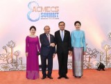 PM Phuc meets Thai and Lao counterparts on fringes of ACMECS 8