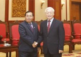 Party leader receives visiting vice chairman of Lao NA