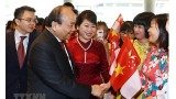 越南政府总理阮春福抵达新加坡出席第33届东盟峰会