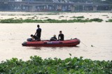 Hàng chục người nhái tìm kiếm nam thanh niên mất tích dưới sông Sài Gòn