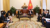 越南政府副总理兼外交部长范平明会见泰国驻越南大使塔尼•桑加特