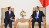 越南政府总理阮春福会见老挝新任驻越南大使森菲特•宏本让
