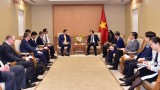 越南政府副总理郑廷勇会见美国和韩国投资商