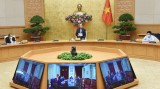 越南政府总理阮春福：社会增速放缓，但从事防疫工作的人员需提速
