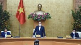 越南政府总理阮春福：迅速为人民开展新冠疫苗接种