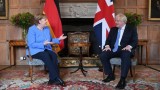Lãnh đạo Anh, Đức thảo luận vấn đề hạn chế đi lại phòng COVID-19