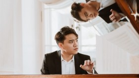 阮越忠钢琴师进入世界最负盛名的钢琴比赛决赛