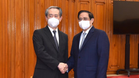 越南政府总理范明正会见中国驻越南大使熊波